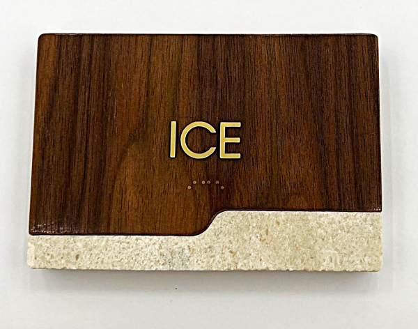 Custom wood-grain common room sign for Omni Hotel by Baron Sign Manufacturing