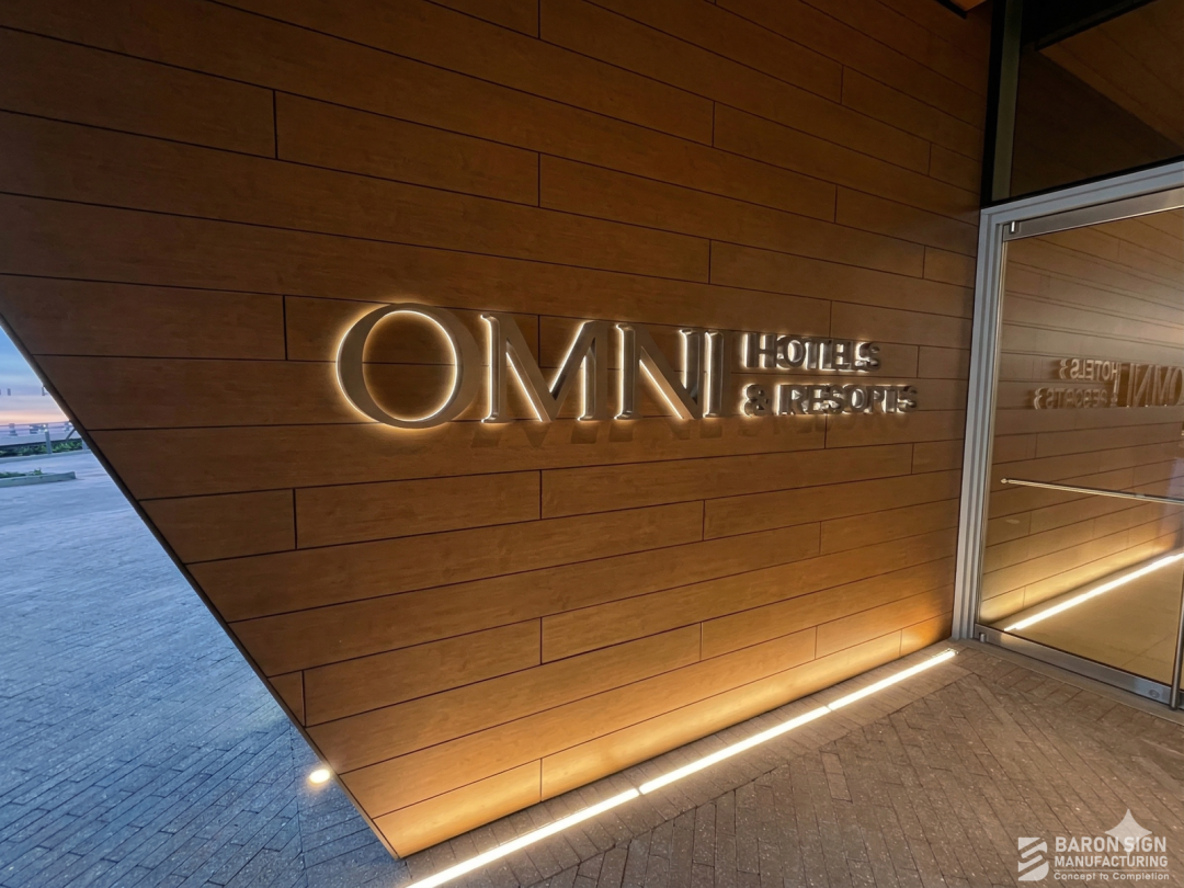 Halo-lit reverse illuminated channel letters for Omni Hotels and Resorts entrance by Baron Sign Manufacturing