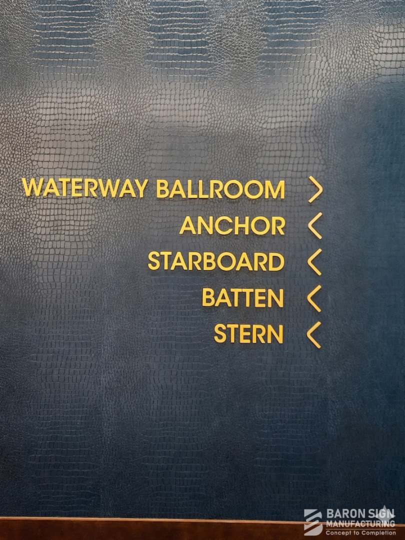 Interior wayfinding directional sign with dimensional gold letters for Omni Hotel Fort Lauderdale by Baron Sign Manufacturing
