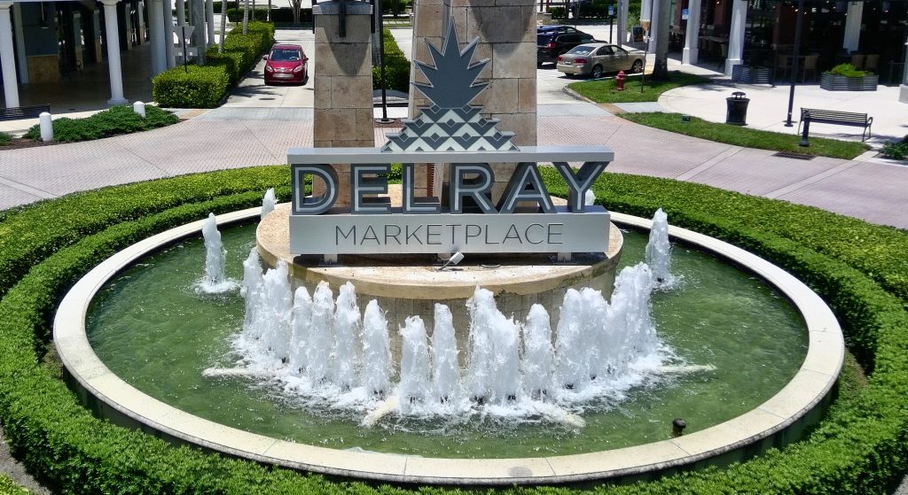 Delray Marketplace stone monument entrance sign with fountain, custom fabricated by Baron Sign Manufacturing