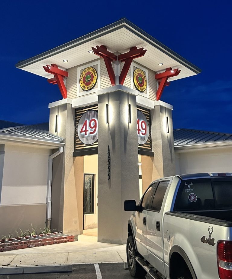 Palm Beach County Fire Rescue Station 49 illuminated station number signage and department seals