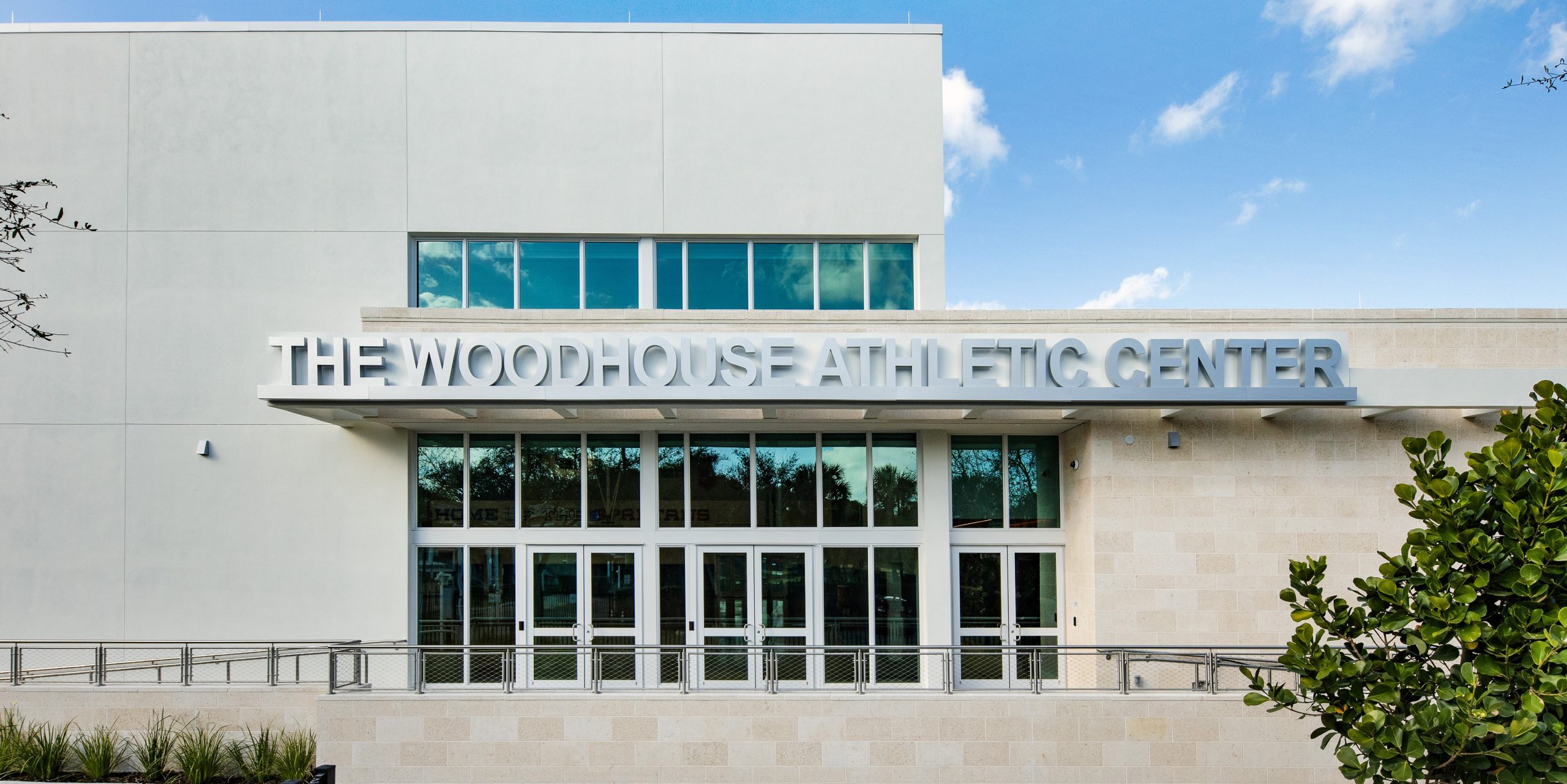 Reverse illuminated channel letters for The Woodhouse Athletic Center in Miami Florida by Baron Sign Manufacturing